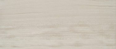 a Chenille White limestone countertop surface that features linear gray design in gray tones