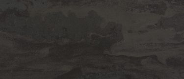 a radium sintered stone countertop surface with an acid black color that has a faded design