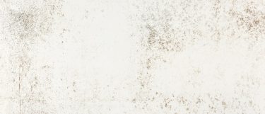 a Nilium sintered stone countertop surface that has an industrial design in white with gray shade details