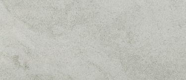 a Kovik sintered stone countertop surface that features dove gray hues with subtle details