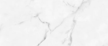 a Kairos sintered stone countertop surface that has gray veins over the cool toned white background