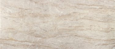 an Arga countertop surface that features subtle brown-gold veins over the cream background