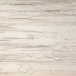 an Aged Timber sintered stone countertop surface that has a light wood color with wood vein patterns over the beige background