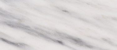a royal danby marble countertop surface that has light and brown veining over the clean white background