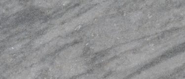 a Fantasy Silver marble countertop that blends together smoky silver grays on its surface