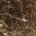 an Emperador Dark countertop surface that features web-like patterns over the rich, dark brown background
