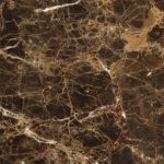 an Emperador Dark countertop surface that features web-like patterns over the rich, dark brown background