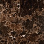 an Emperador Dark marble countertop surface that features web-like patterns over the rich, dark brown background
