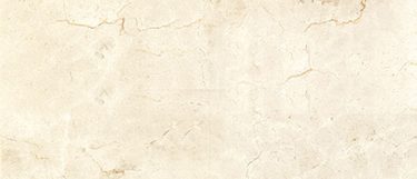 a Crema Marfil Select marble countertop surface that features colors of crems, beiges, and whites with light vein details in gold