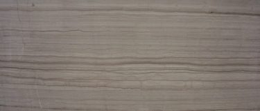 a silver screen marble countertop surface that has horizontal veining pattern in warm taupe gray