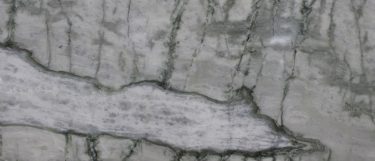 an Iced Onyx marble countertop surface that has a gray color with gray veining