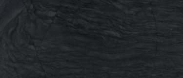 a platinum black quartzite countertop surface that has a black color with various dark veins