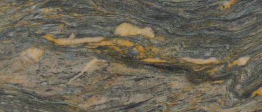an Azul Treasure quartzite countertop surface that features a swirl of yellow color with charcoal and hints of turquoise