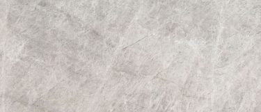 an Allure quartzite countertop surface that features a blend of grays, blues, creams, and white veining