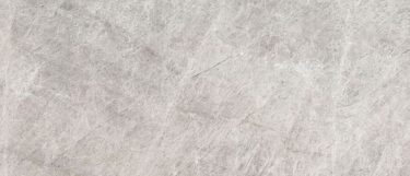 an Allure quartzite countertop surface that features a blend of grays, blues, creams, and white veining