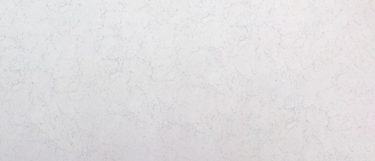 a valley white quartz countertop surface that features soft gray veining over the misty white background