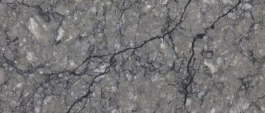 a thunder grey quartz countertop surface that features black veining and white speckles over a dark gray background