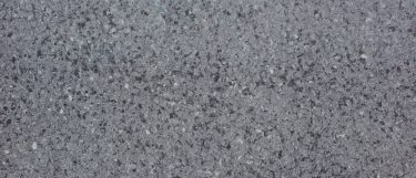 a squalo countertop surface that blends flecks of white with various shades of grays