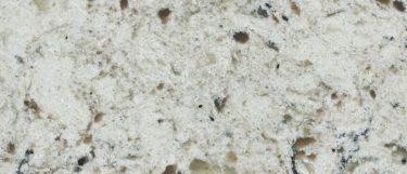 a safari quartz countertop surface that has white, gray, and brown flecks and veins over the white background