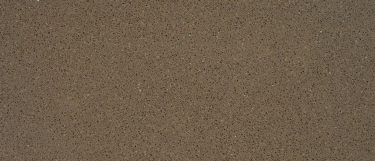 a Meteorite quartz countertop that features deep gray and gold specks over its surface