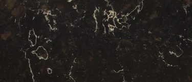 a Java Noir quartz countertop surface that features subtle white veins that contrast the dark brown and black background
