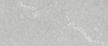 a Grey Savoie quartz countertop surface that features white veins over the gray background