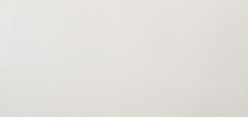 TN | Pro Stone Countertops a Gioia Carrara quartz countertop surface that has warm gray veins over the creamy white background