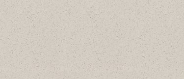 a Crystal Pepper quartz countertop surface that features flecks and glass-like fragments over the creamy white background