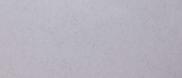 a Ceres quartz countertop surface that features white and brown veining details over the silver pearl background
