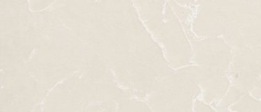 Botticino Classic quartz countertop surface that features white streaks over the rich ivory background