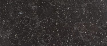 a Belgium Blue quartz countertop surface that features subtle white speckling over the deep base
