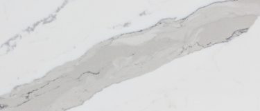 an Arabescato quartz countertop surface that features vein details in black and gray over the white background