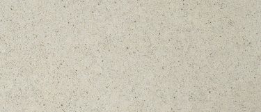 an Altea quartz countertop surface that features a sand grain design in cream color