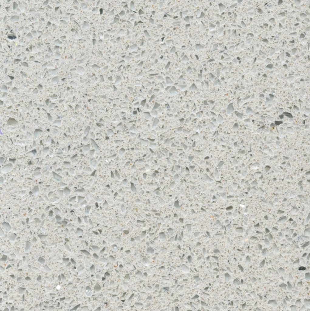 a stellar blanco quartz countertop surface that features white and gray grains over the white background