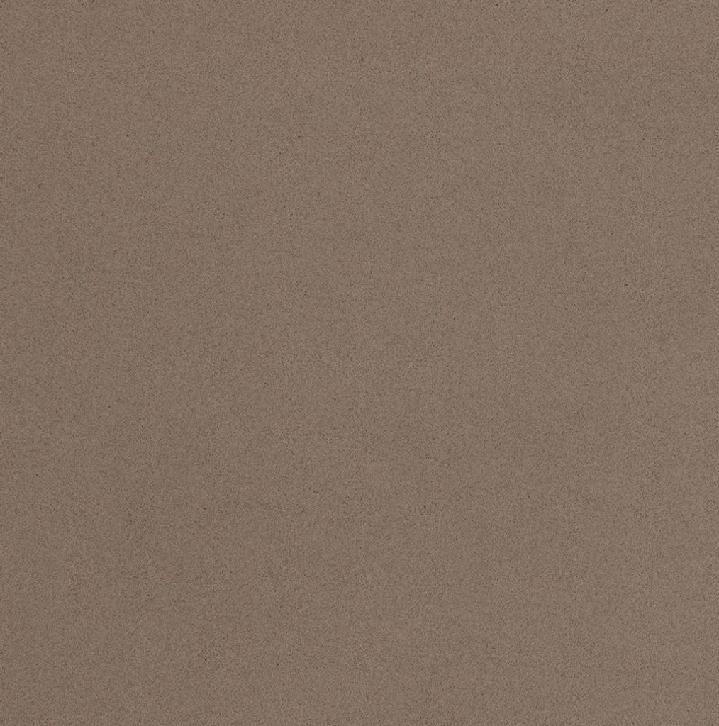 a Noka quartz countertop surface that has a mocha brown color with speckling pattern in brown, gray, and cream