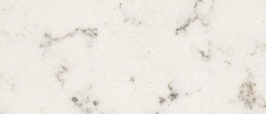a Lyra quartz countertop surface that features veining pattern in cream, black, brown, and gray over the white background