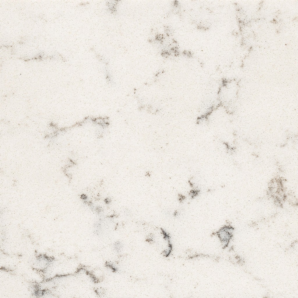 a Lyra quartz countertop surface that features veining pattern in cream, black, brown, and gray over the white background