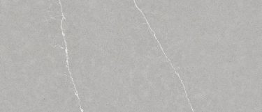 an Eternal Serena quartz countertop surface that has a gray color with white linear veins