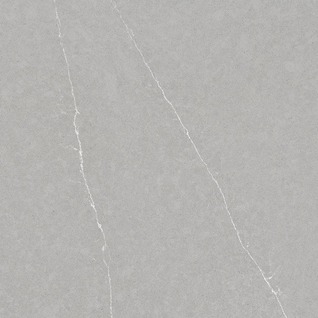 an Eternal Serena quartz countertop surface that has a gray color with white linear veins