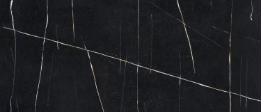 an Eternal Noir quartz countertop surface that features white linear veins over the dark black background