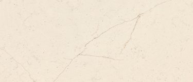 an Eternal Marfil quartz countertop surface that features soft copper veining over the cream background
