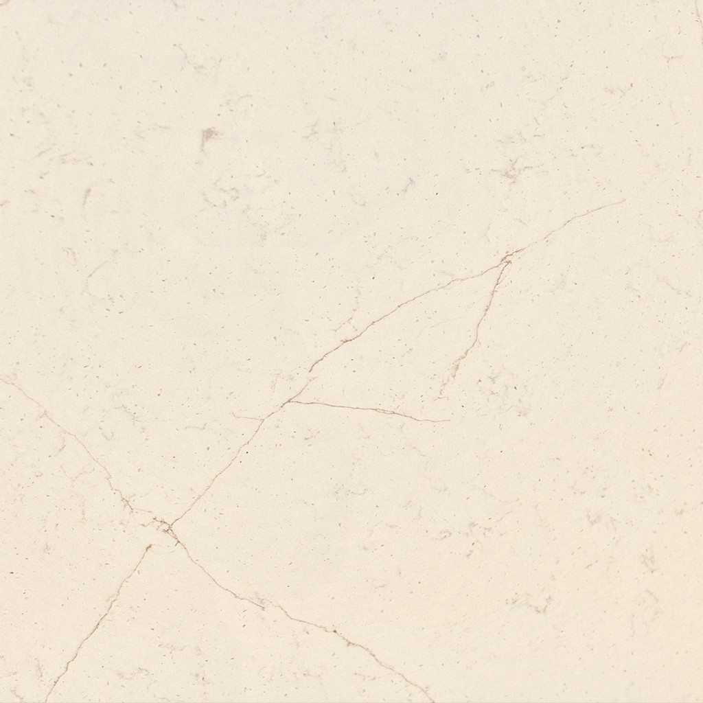 an Eternal Marfil quartz countertop surface that features soft copper veining over the cream background