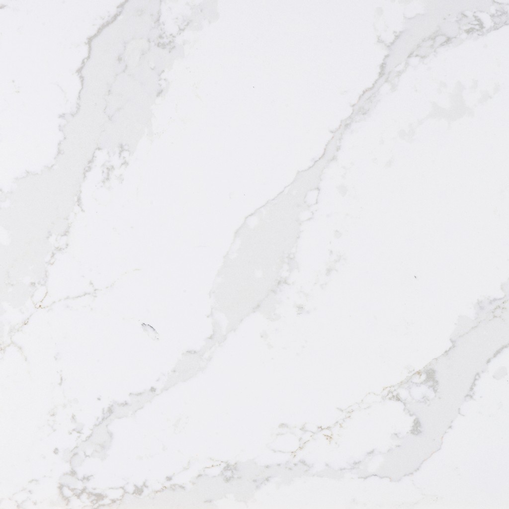 an Eternal Calacatta Gold countertop surface that features grey highlights with gold details over the white background