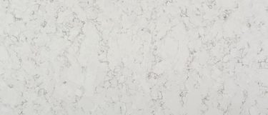 a Blanco Orion quartz countertop surface that feaures soft gray hues in veining pattern over the white background