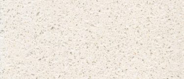 a Blanco Maple quartz countertop surface that features speckling pattern in gray over the silky cream background