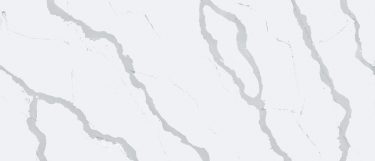 a Bianco Calacatta quartz countertop surface that features thick gray veins over the white background