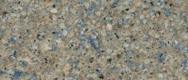 an Azul Ugarit quartz countertop surface that features gray tones, blue speckles, and hints of orange over the cream background