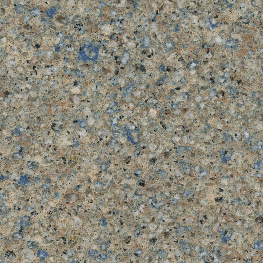an Azul Ugarit quartz countertop surface that features gray tones, blue speckles, and hints of orange over the cream background