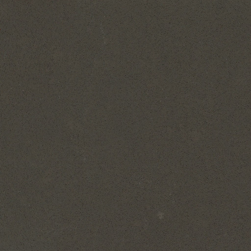 an Altair quartz countertop surface that features speckles in gray and brown over the taupe colored background