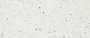 a sparkling white quartz countertop surface that has a crisp white background with speckles